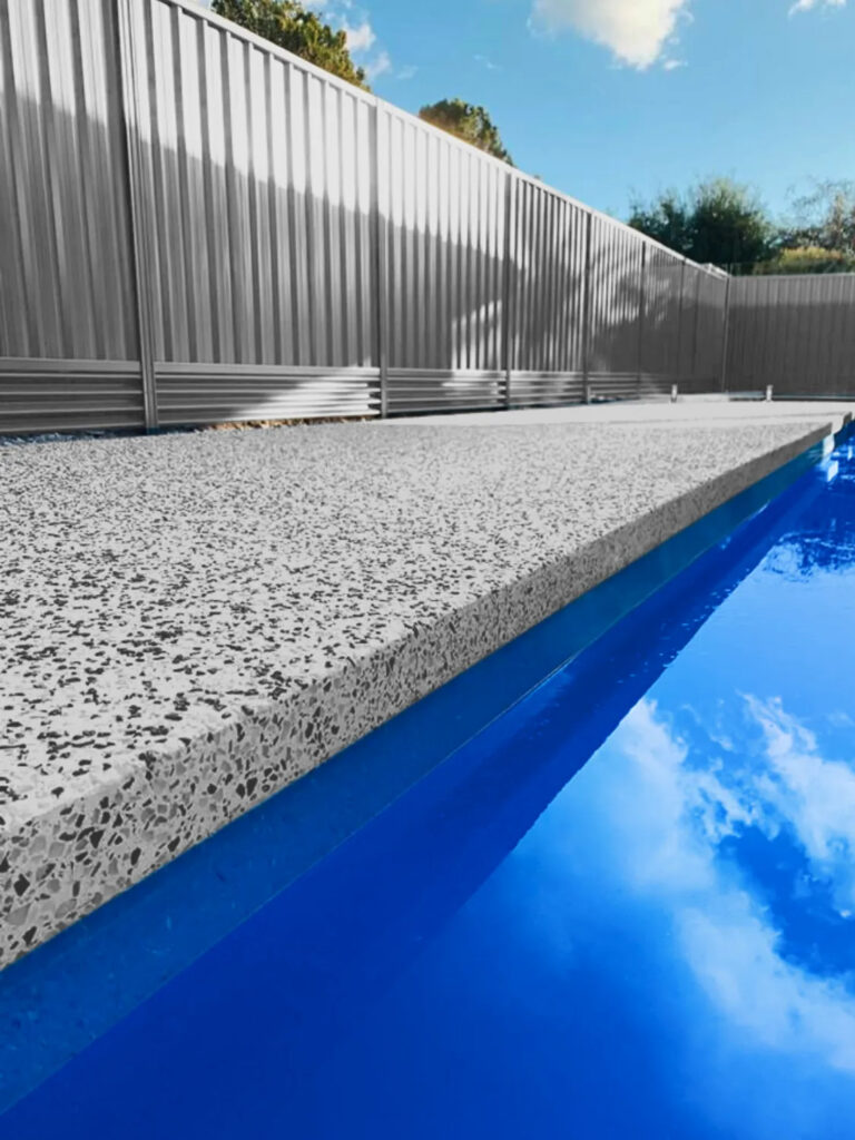 Exposed aggregate concrete pool surround on the Gold Coast