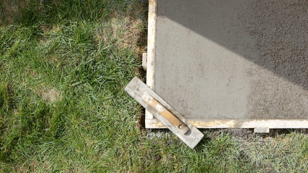 Screeding a concrete shed slab on the Gold Coast
