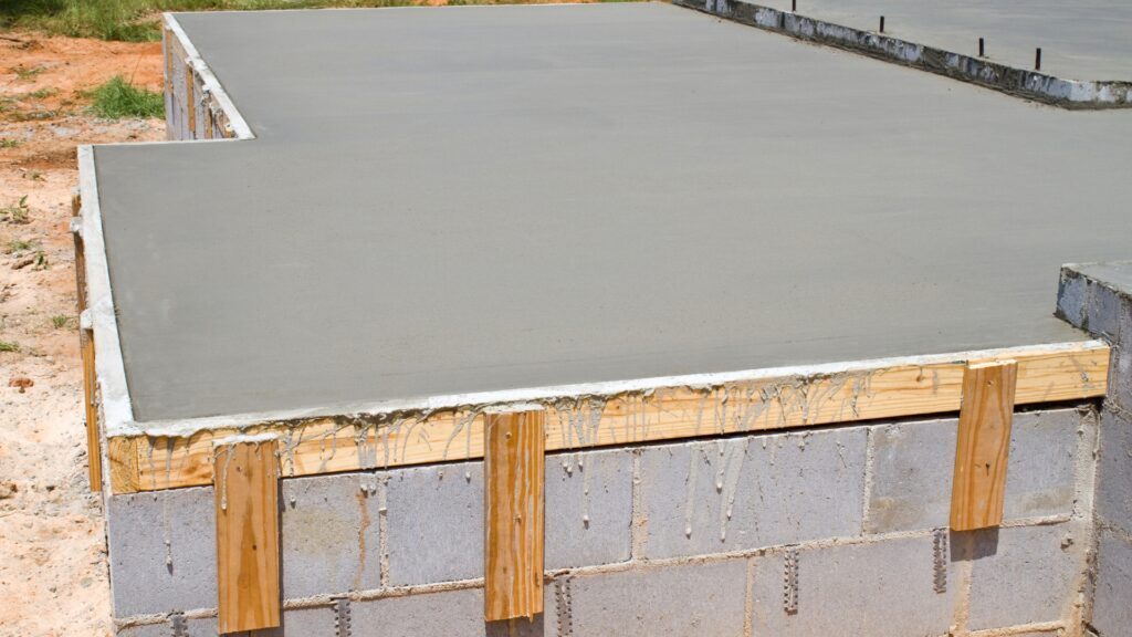 Finished concrete slab with edge formwork in place